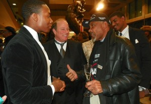 Mike Duggan, who wants to be Detroit's first white mayor since before Coleman Young, joshes with his lackeys at Auto Show Jan. 18, 2013.