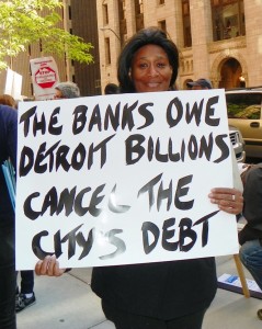 Linda Willis participates in downtown Detroit protest May 9, 2012 demanding payback from the banks.