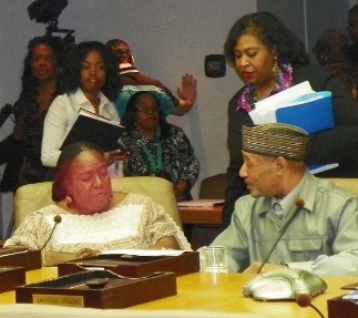 Detroit City Councilmembers JoAnn Watson (l), Brenda Jones, (center), and Kwame-Kenyatta-consult-after Council's "Fatal Five" members approved consent agreement April 4, 2012, the anniversary of Dr. Martin Luther King's assassination.