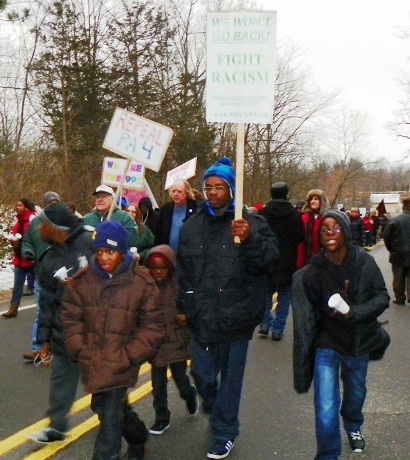 Marchers on Snyder's house demand a fight against racism, Jan. 16, 2012.