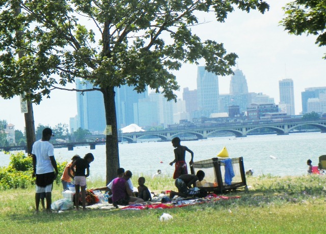 Family picnics near Belle Isle beach with beautiful view of downtown Detroit. BELLE ISLE BELONGS TO US!