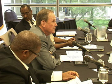 Ken Whipple (center) and Darrell Burks (rear) of Financial Advisory Board also sit on Financial Review Team.
