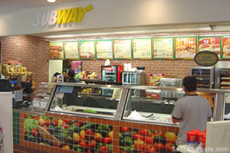 Subway workers in Detroit said they fell off fiscal cliff in their 2013 paychecks, while Subway went up on its prices.
