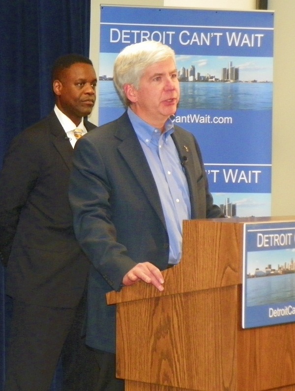 Michigan Gov. RIck Snyder announces appointment of Kevyn Orr (in rear) as Detroit EFM March 14, 2013.