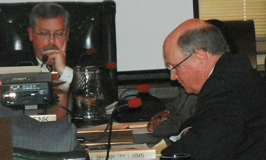 BOWC chair James Fausone and Oakland Co. rep. J. Bryant Williams appear to be deeply studying RCC report at meeting March 13, 2013. They couldn't have studied TOO hard, as blatant falsehoods were rampant in report..