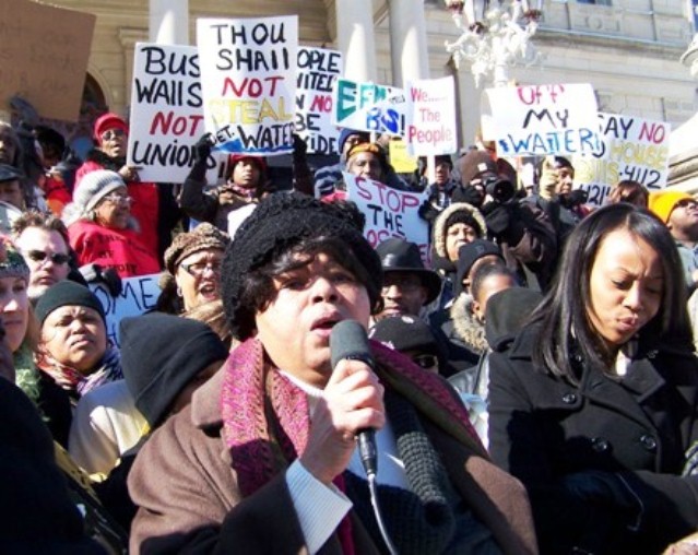 Sandra Hines speaks at Feb. 2011 rally in Lansing against takeovers.
