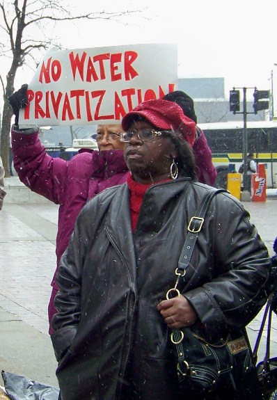 Detroiters rally against water privatization.