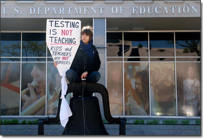 Child at DOE protests standardized testing.