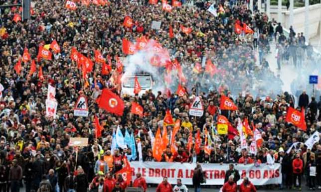 In 2010, French workers carried out a general strike and protests in the millions across the country to stop changes to their pension systems, which allowed workers to retire at 60. The government wanted to change the age to 62. They were victorious. Photo shows protest in Lyon.