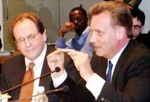 Stephen Murphy of Standard and Poor's (r) and Joe O'Keefe of Fitch Ratings sell Detroit City Council on %1.5 billion UBS AG loan in 2004.