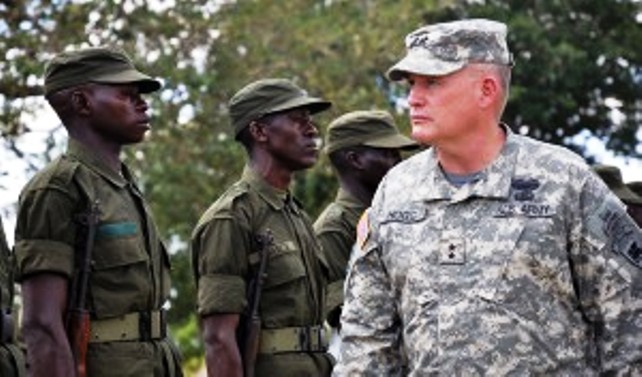 US Major General David Hogg inspects Ugandan troops. Photo Ryan Sutherland