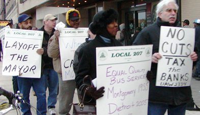 Leamon (;l) protests with others at the Mayor's State of the City address in 2004.