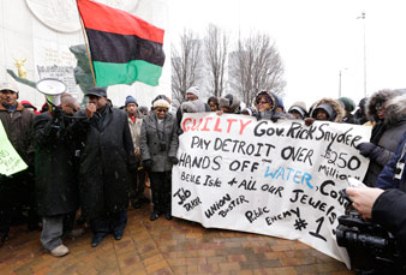 Protesters rally outside CAYMC in Detroit as EM takes office March 25, 2013.