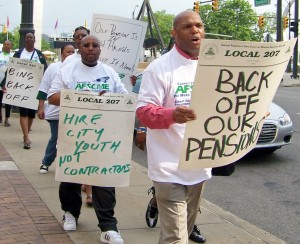 City workers protest against designs on their pensions, demand jobs for the youth.
