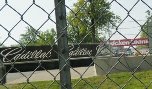 Cadillac and Quicken Loans on fenced-off race course.