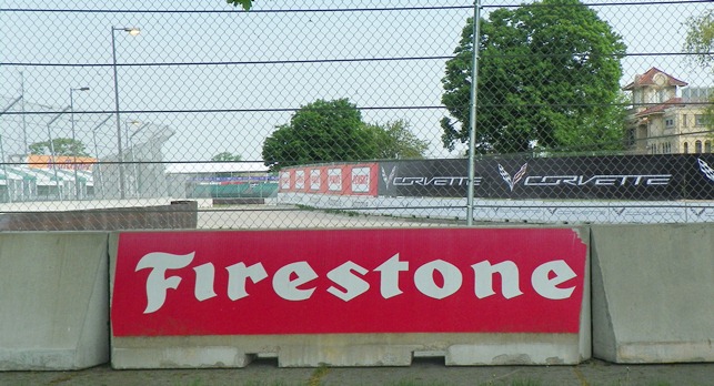 Firestone and Corvette signs adorn the barricades at the 2013 DBIGP.
