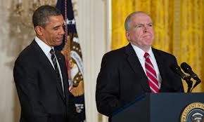 President Barack Obama and CIA director John Brennan at his swearing in.