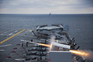 The amphibious assault ship USS Kearsarge (LHD 3) fires a Rolling Airframe Missile (RAM) during a live-fire exercise, Jan. 26, 2013. Kearsarge is conducting amphibious squadron/Marine expeditionary unit integration in preparation for a scheduled deployment this spring. (U.S. Navy photo by Mass Communication Specialist 3rd Class Tamara Vaughn/Released) 