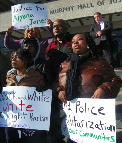 Family members of Aiyana Jones rally March 8, 2013 outside courthhouse. Bottom  (l) mother Dominika Jones. (r) Aunt LaKrystal Sanders. Behind Dominika is Aiyana;s paternal grandmother Mertilla Jones, and behind her is maternal grandfather Jimmie Stanley.