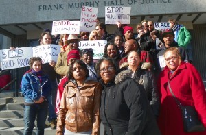 Jones and Stanley family members rally on courthouse steps March 8, 2013.