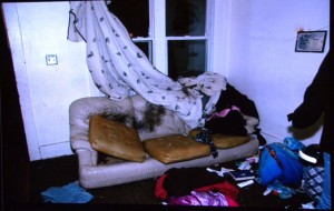 Evidence photo shows couch where Weekley shot Aiyana in the head. Hannah Montana blanket is at bottom of photo.