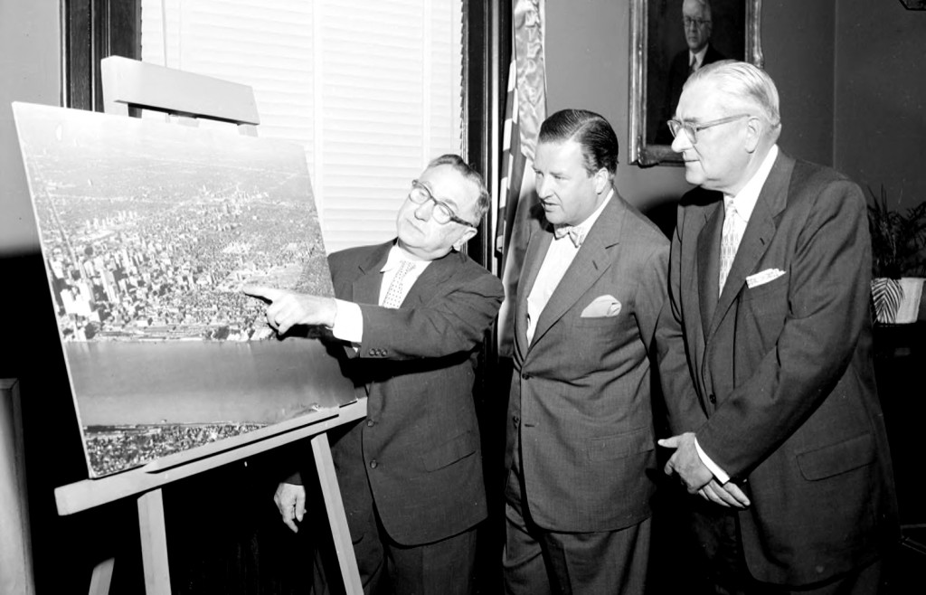 While Detroit Mayor Edward Jeffries may have initiated the Detroit Plan in the late 1940s, it was his successor Mayor Albert Cobo, 1950-57, (above, pointing) who pile-drived the idea into something tangible. Though regarded as a good mayor by 1950s standards, Cobo definitely set in place a social minefield of problems which would later explode on his successors. Perhaps history has granted him leniency because he died in office. Nevertheless, his failure to address the acute black housing problem may have pleased his constituents, but it was to spell doom for the city in the racial upheaval of the 1960s.  From: Detroit: The Blood Never Dried.