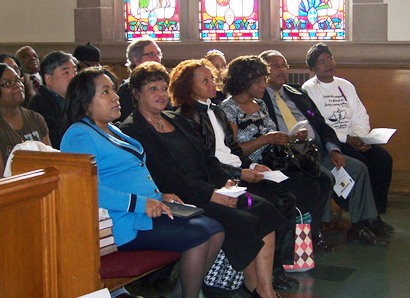 Some of Maryanne Godboldo's family members at Hartford Memorial Church rally shortly after her release from jail in 2011. Her sister Penny is third from left.