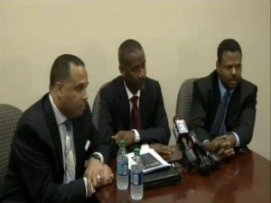 Family spokesman Skip Mongo (l) with attorneys for teen in lawsuit vs. Pugh,