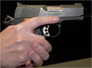 Firearm safety involves keeping finger off trigger, even when someone grabs weapon.
