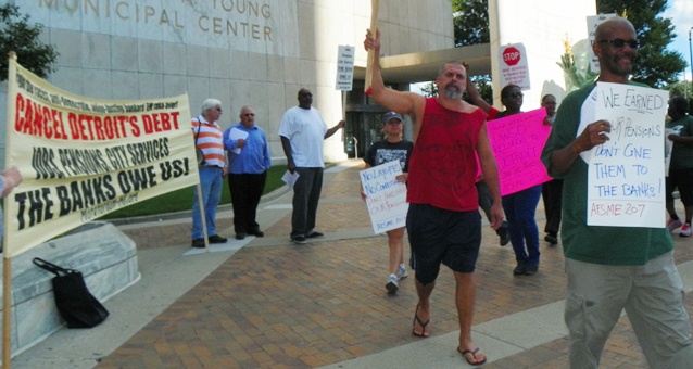 Retirees, union members and their supporters protested outside the Coleman A. Young Center July 25, 2013.