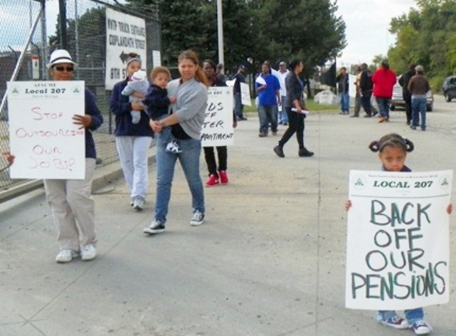 Detroit city worker's child demands "Back off our pensions" during strike at Wastewater Treatment Plant Sept. 30, 2012.