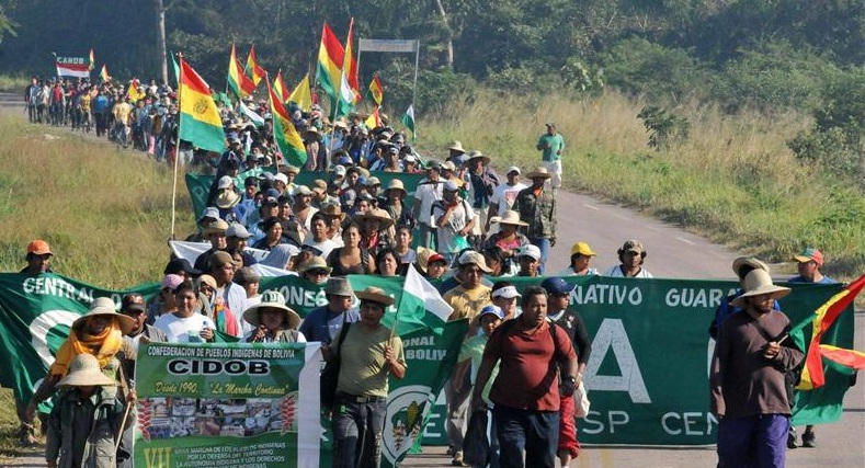 Bolivia's indigneous people march to stop construction of highway through their ancestral lands.