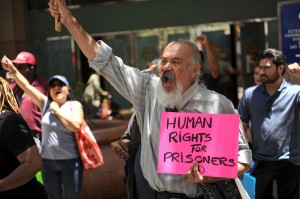 Guillermo Cuauhtemoc protests outside the Ronald Reagan State Building in downtown L.A. Monday, July 8, 2013, against solitary confinement in California prisons. (Michael Owen Baker/L.A. Daily News)