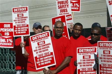 Detroit firefighters protest bankruptcy filing July 24, 2013 outside federal court. It endangers their pensions, and they are not eligible for Social Security.