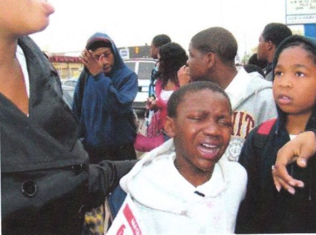 Students after police pepper spray atack during 2007 protest against school closings outside Northern High School.