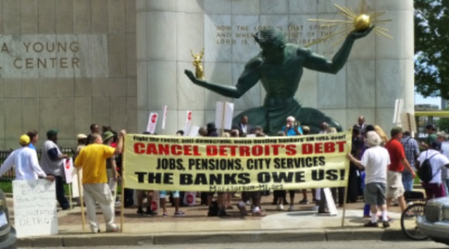 Protesters at the Coleman A. Young Municipal Center July 26, 2013 denounce criminal banks.
