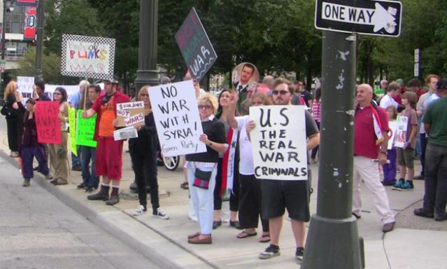 Protesters lined Woodward Avenue in Detroit Sept. 8 to stop war on Syria.