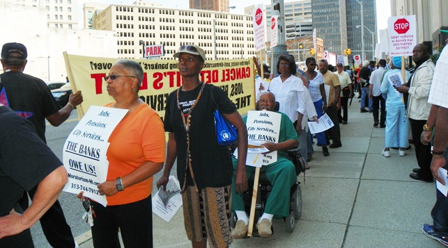 Retirees and residents protest at bankruptcy court hearing Aug. 19, 2013.