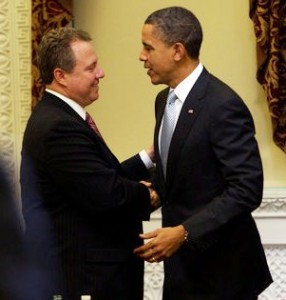 Pres. Barack Obama shakes hands with his friend Robert Wolf, formerly of UBS, one of Obama's major campaign fundraisers.