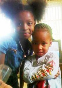 Aiyana Jones and little brother Carlos, who was in the house with the rest of her family when she was shot to death.