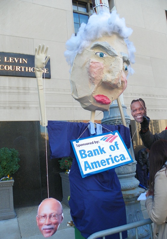 Protesters decried banks' role in Detroit takeover.
