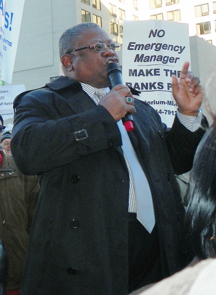 Ed McNeil of AFSCME Council 25 speaks at rally.