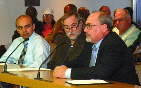 (L to r) Saqib Batti, Rev. Bill Wylie-Kellerman, Atty. Tom Stephens testify against deal. 