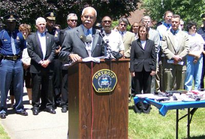 Former Detroit police chief Warren Evans in anti-crime press conference in affluent Grandmont-Rosedale neighborhood with federal, state, county police officials, June, 2010 Photo by Diane Bukowski