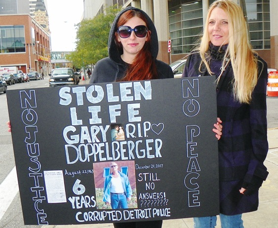 Gabrielle and Stacy Harrison attended rally to protest police inaction in case of their father and fiance Gary Doppelberger.