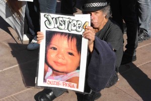 Steve Baratta holds a photo of 19-month-old Suzie Pena, who was killed by LAPD SWAT in 2005. Baratta says Pena’s death was very emotional for him and further galvanized him in fighting police brutality. (Dan Bluemel / LA Activist)