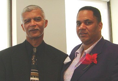 Chokwe Lumumba (l), famed Detroit revolutionary activist, now Mayor of Birmingham, Ala, with Cornell Squires (r) at court hearing.