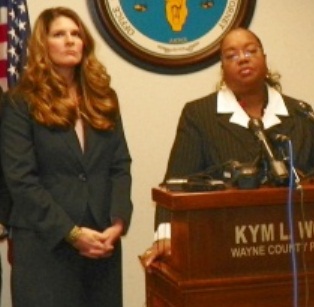 Asst. Prosecutor Danielle Hageman-Clark with Prosecutor Kym Worthy during announcement of charges against Wafer.