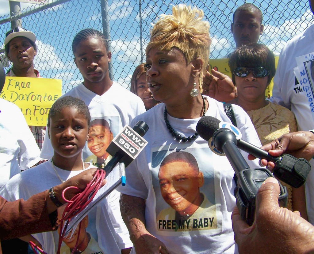 Taminko Sanford-Tilmon is interviewed at rally for her son Davontae outside Frank Murphy Hall June 29, 2010.