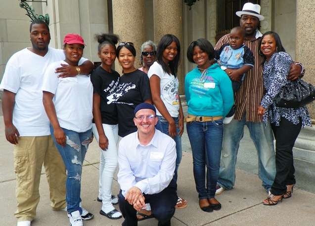 Davontae's family, including mother Taminko Sanford-Tilman and father at right, along with supporters at Appeals Court hearing Aug. 6, 2013. Paralegal Roberto Guzman, who has tirelessly fought for Davontae's freedom, is shown in center front.
